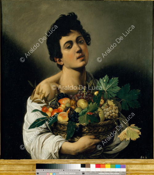 Boy with basket of fruit