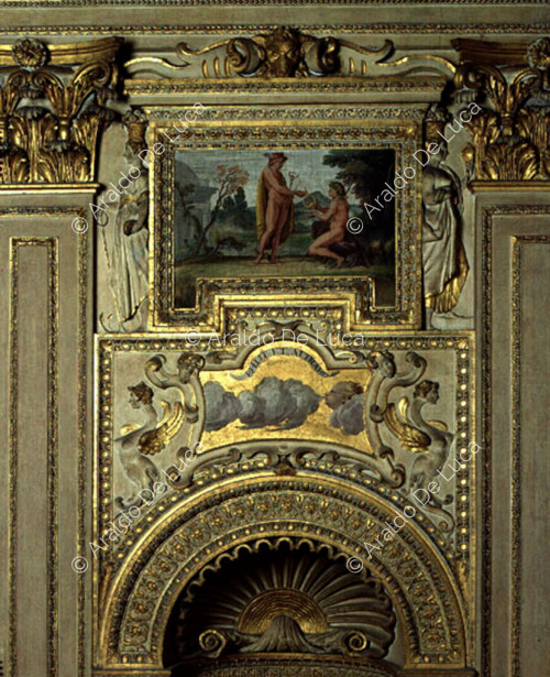 Stucco-decorated wall and fresco with Mercury