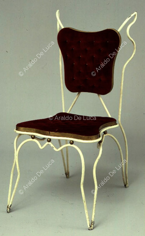 Chair upholstered in red fabric