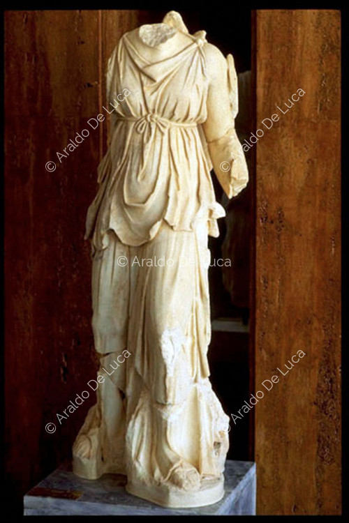 Headless female statue