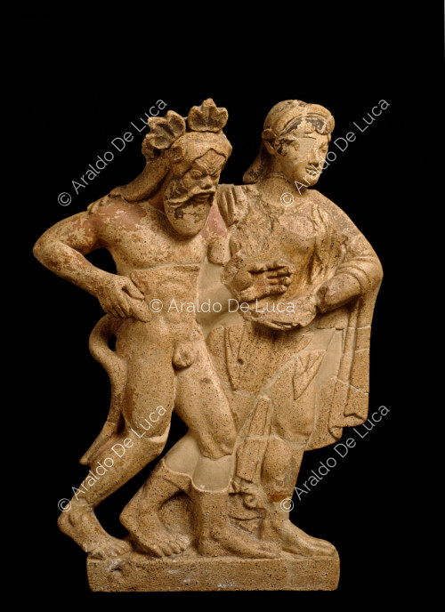 Antefix in the form of a satyr and maenad