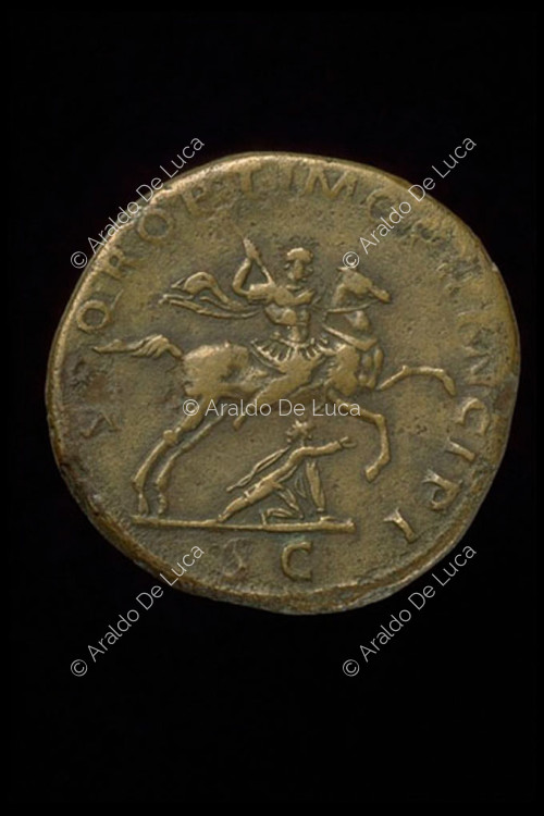 Trajan on horseback on leader Dacius on the ground, imperial aureus of Trajan