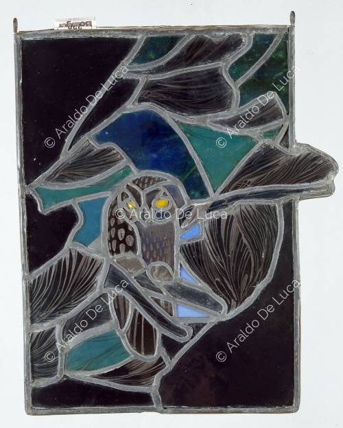 Stained glass window with owl