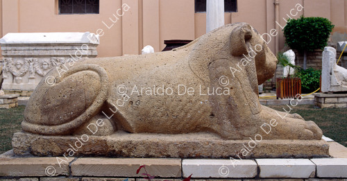 Reclining lion statue