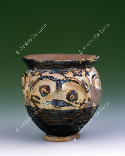 Decorated terracotta vase