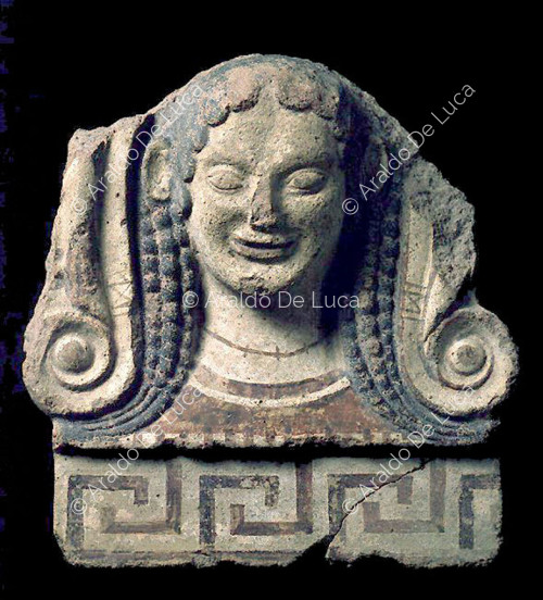Polychrome terracotta antefix with mask