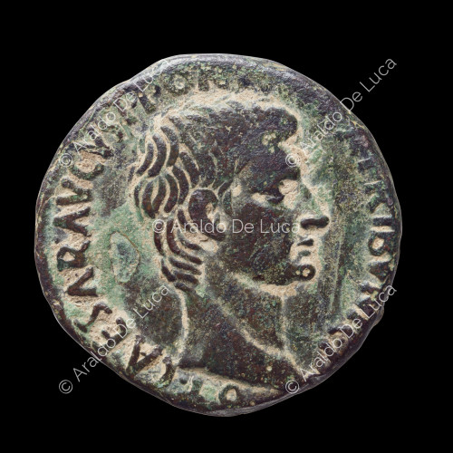 Head of Augustus right, Roman Imperial Axis of Magistrate M. Salvius Otho