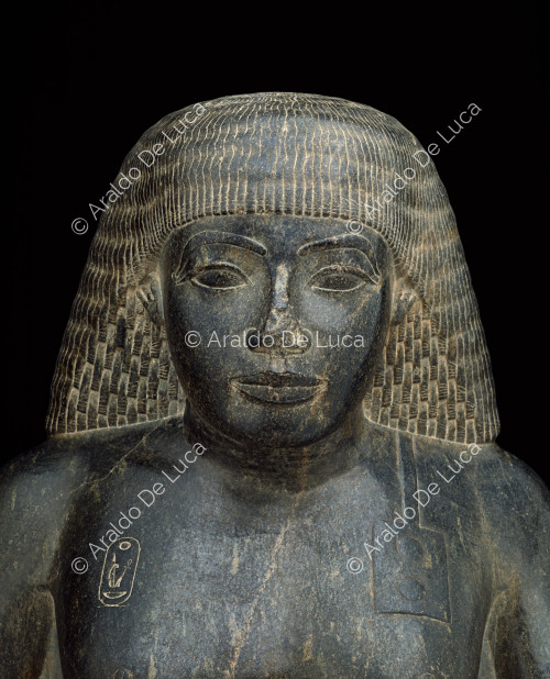 Amenofi son of Hapu posing as a scribe