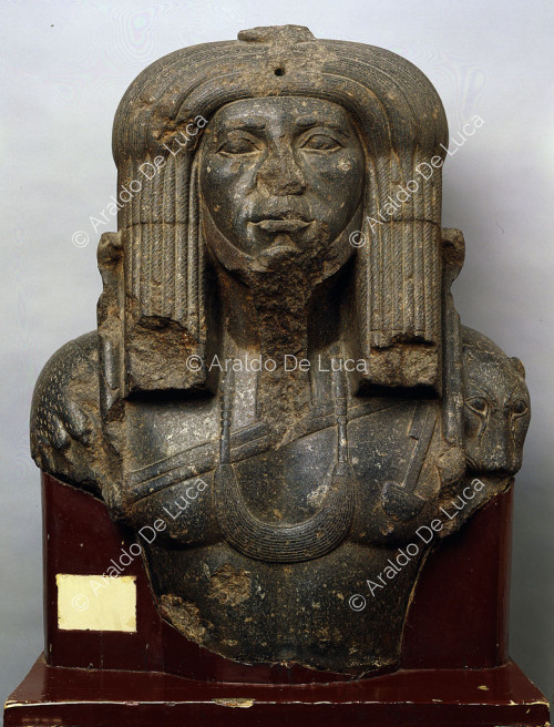 Upper part of a statue of Amenemhat III in priestly dress