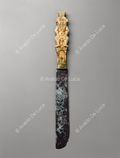 Knife with ivory handle in the shape of the God Bes