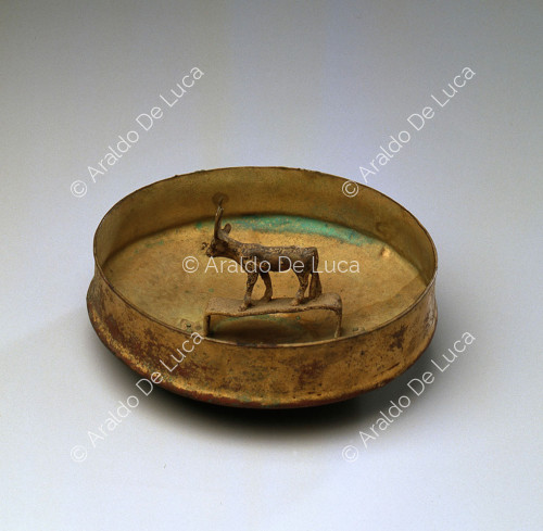 Dish with a cow figurine