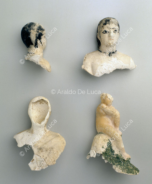 Fragments of statuettes