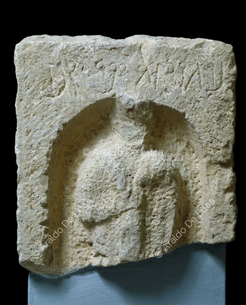 Kiosk with relief of man