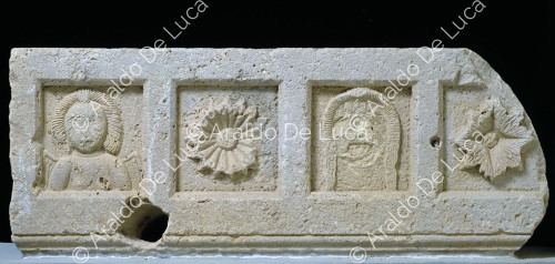 Metope decorated with theatre masks and flowers