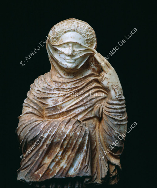 Veiled female tomb bust