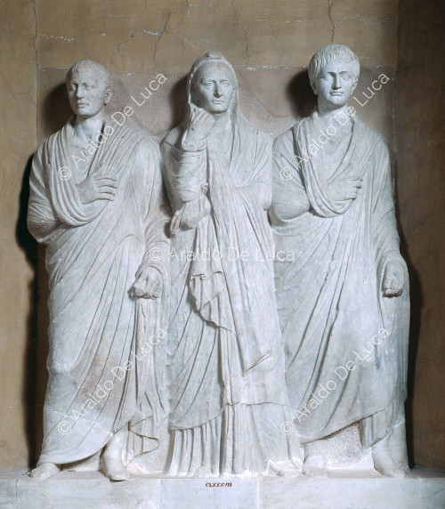 Funerary relief with three figures