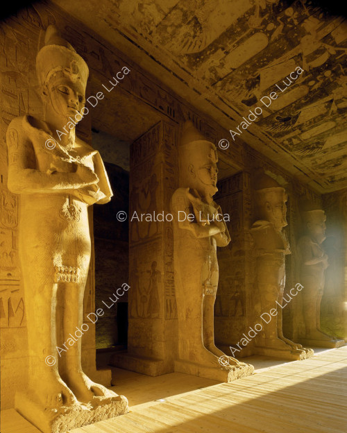 Great Hall with pillars and statues of Ramesses II in the form of Osiris