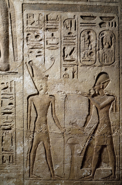 Temple of Ramesses II. Wall decoration. Detail with Ramesses II and Amon-ra