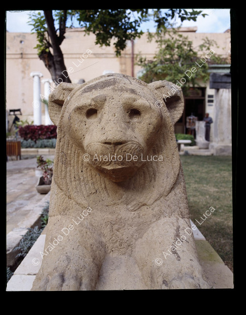 Reclining lion statue