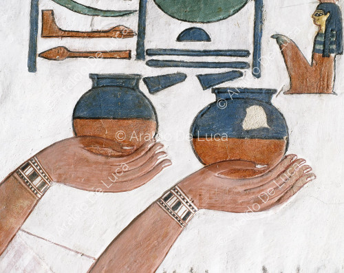 Nefertari offers wine. Detail