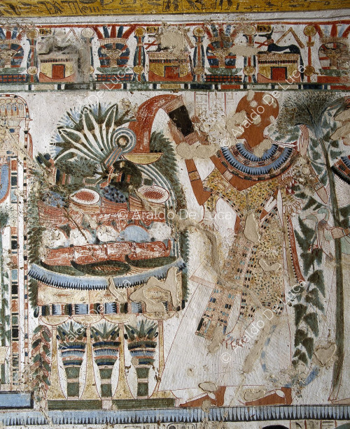 Userhat pouring libations over the offerings for Osiris