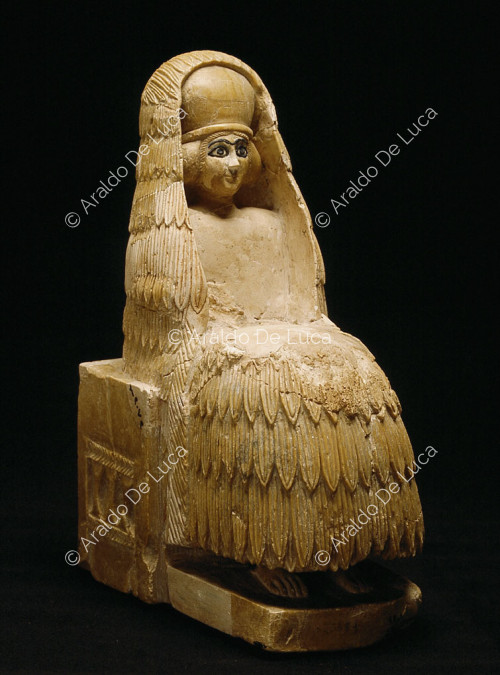Seated female statue