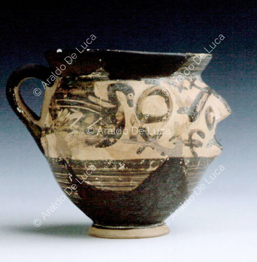Etruscan-Corinthian human mask mug
