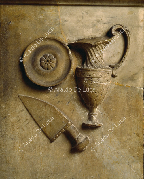 Slab with ritual utensils