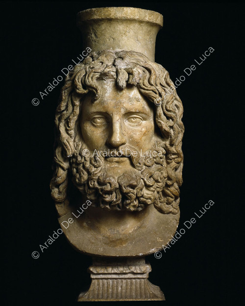 Vase mit Jupiterkopf