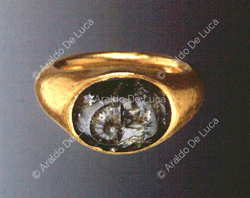Ring depicting a bull emerging from a shell
