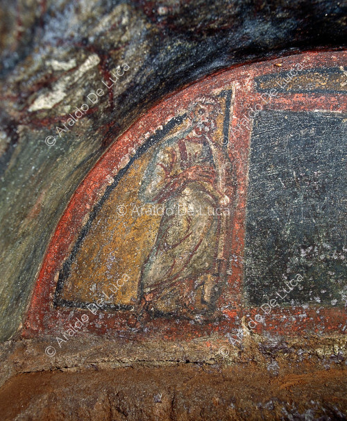 Luneto con fresco. Detalle con figura de Santo