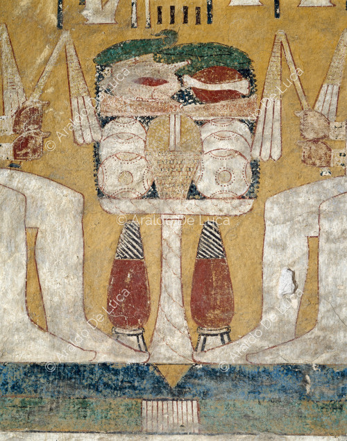 Die vier Söhne des Horus vor einem Opfertisch sitzend