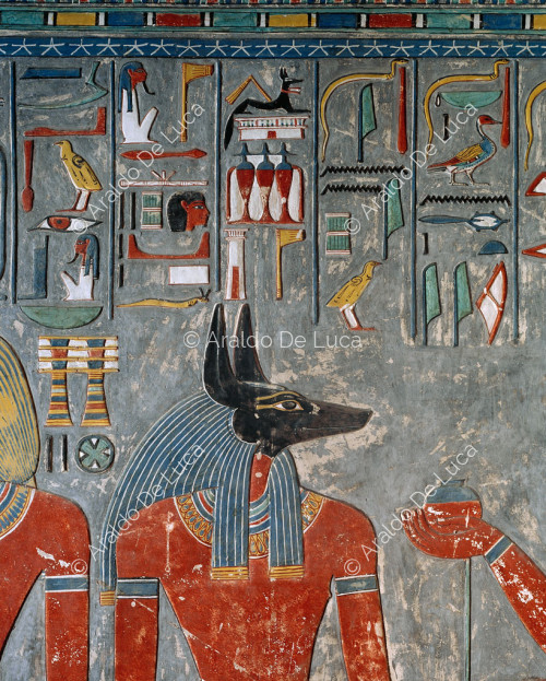 Anubis receives wine from Horemheb