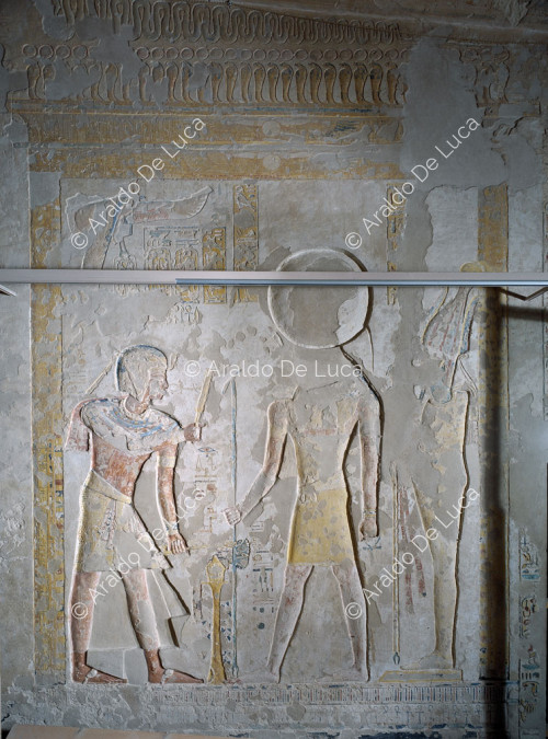 Ramesse IX davanti a Ra-Horakhty e Osiride