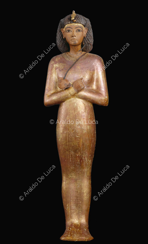 Statuetta in legno dorato