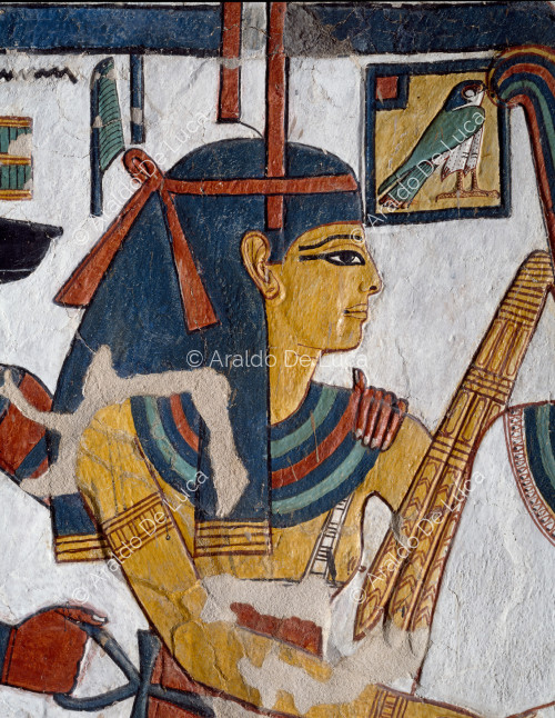 The goddess Hathor of the West embraces Osiris
