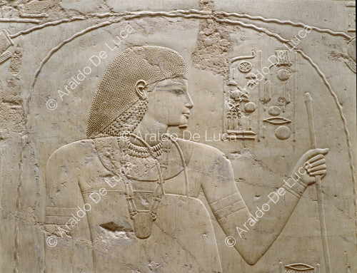 Detail of the representation of the statue of the deceased Ramose purified by two priests and acclaimed by others.