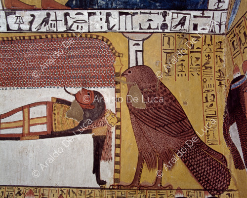 Funeral chamber. The mummy of the deceased protected by the goddess Nephthys in the form of a falcon.