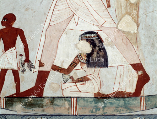 Kneeling female figure (detail)