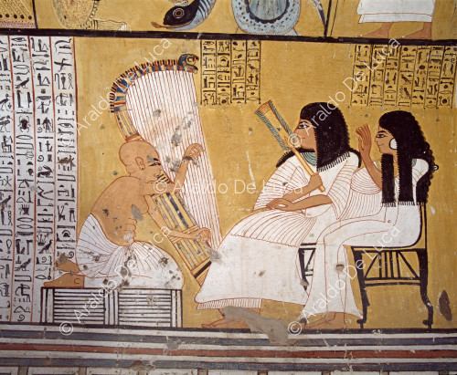 Inherkau and his wife Uab listen to a harpist.