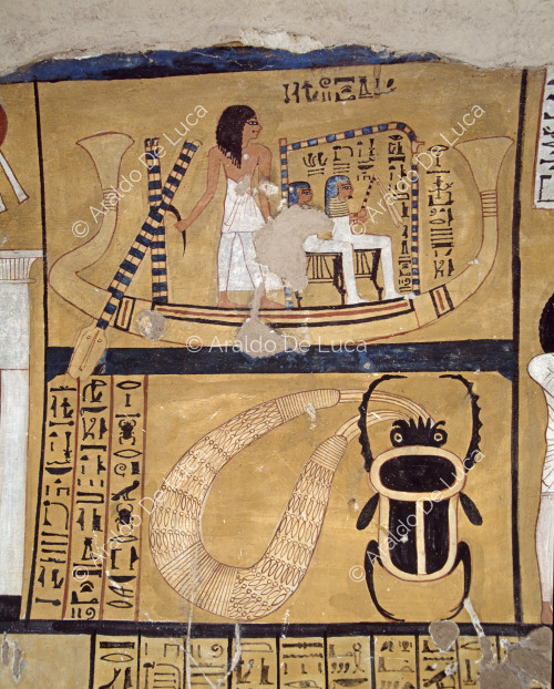 Inherkau and his wife in a boat pulled by their son and a beetle hanging from a necklace.