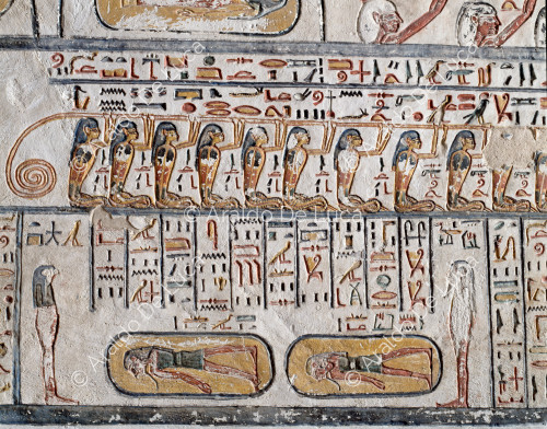 Book of the Earth: uraeans with human heads carry the solar boat and burials