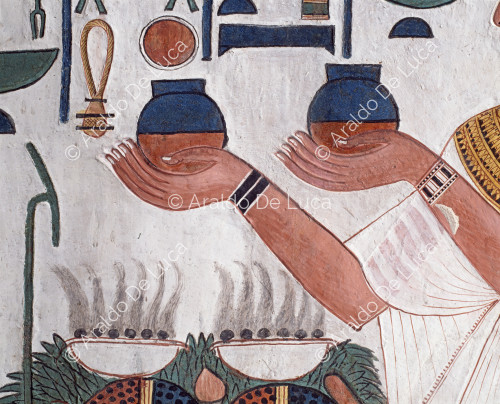 Nefertari offers the nemset jars to Hathor, Selkis and Maat
