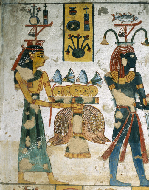 Dio Nilo e dea rappresentante Eliopoli recano offerte di cibo