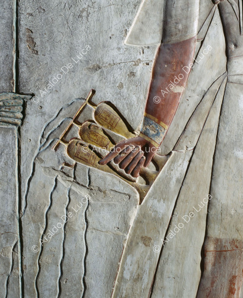 Detail of Ramesses III offering incense to Ptah-Sokar and performing libations