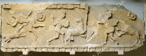 Stone relief with hunting scene