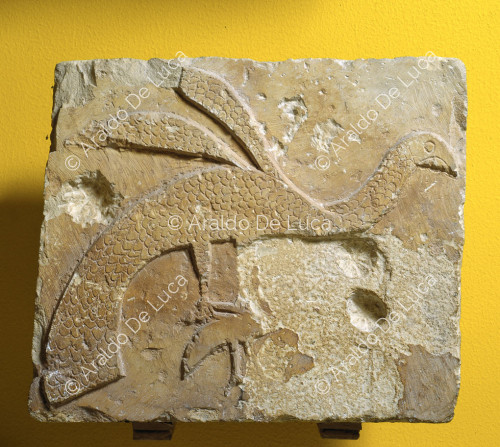 Relief with hawk and rabbit