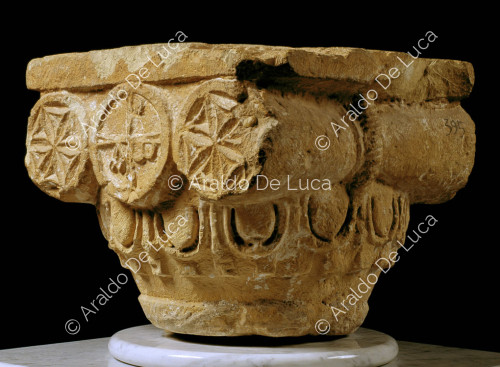 Stone capital decorated with a geometric motif
