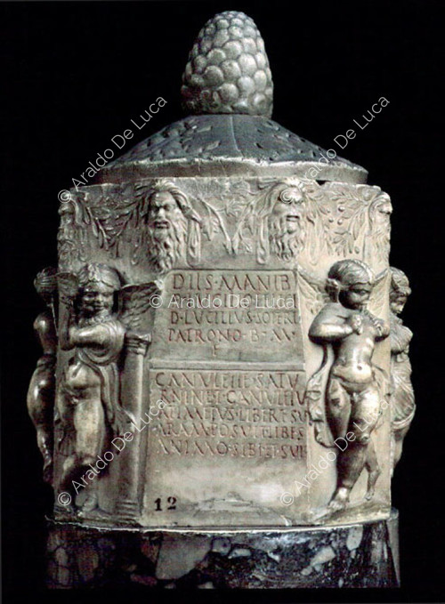 Relief-decorated cinerary urn