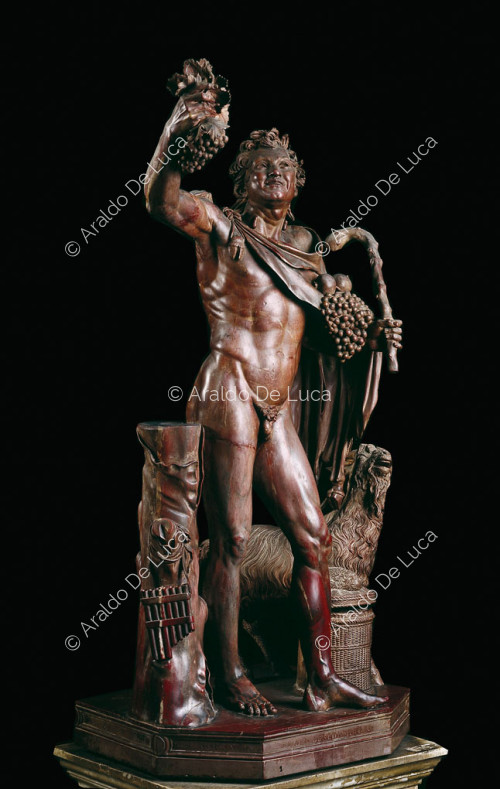 Statue of drunken Faun in antique red